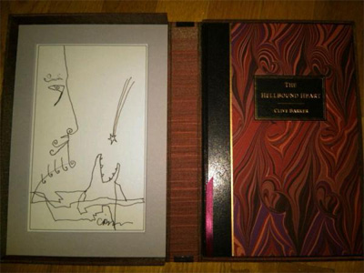 The book and traycase interior, with original art by Barker.